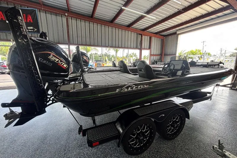 Slide: The Image of 2025 Falcon Boats 21 Predator in showroom, featuring Yamaha engine and sleek design. - 3