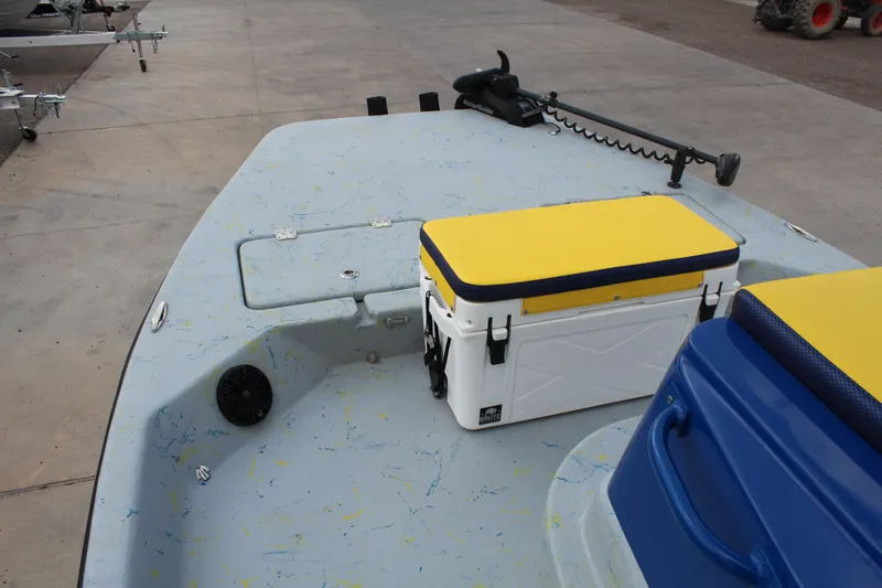 Slide: The Image of 2015 Shoalwater 23 Catamaran deck with coolers and trolling motor. - 13