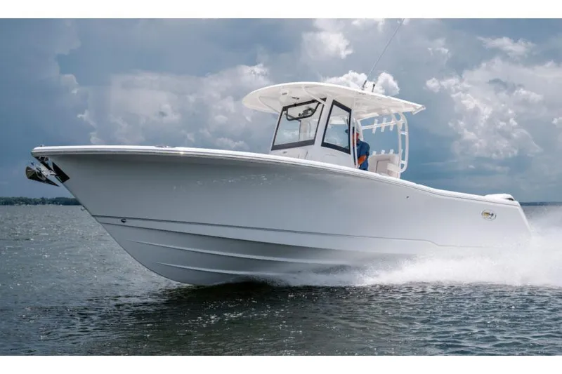 The Image of Manufacturer Provided Image: 2026 Sea Hunt Gamefish 30 Coffin Box boat cruising on water under cloudy sky. - 0