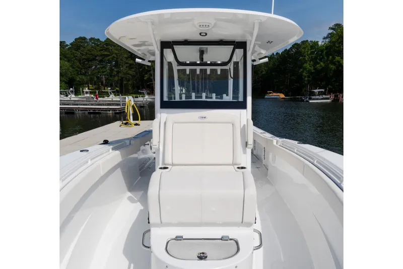 Slide: The Image of Manufacturer Provided Image: 2026 Sea Hunt Gamefish 30 Coffin Box boat docked on a serene lake. - 4