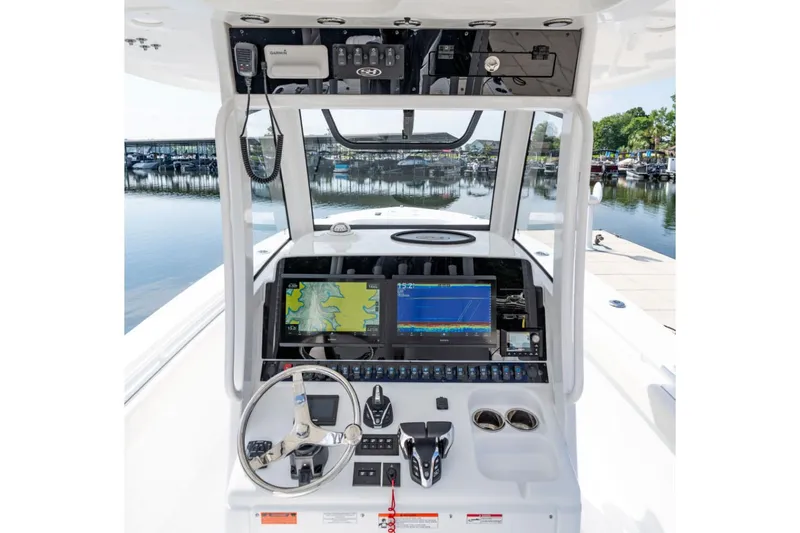 Slide: The Image of Manufacturer Provided Image: 2026 Sea Hunt Gamefish 30 Coffin Box dashboard with navigation screens and controls. - 5