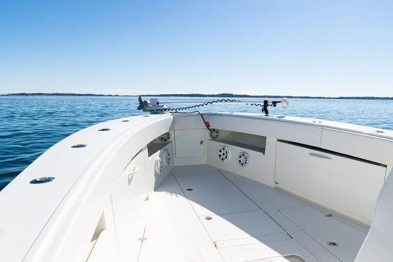 Slide: The Image of 2016 SeaVee 390Z boat deck with ocean view, clear sky, and modern design. - 14