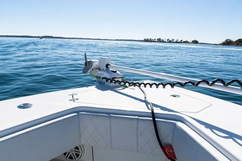 Slide: The Image of 2016 SeaVee 390Z boat on calm ocean waters, featuring a sleek bow design. - 20