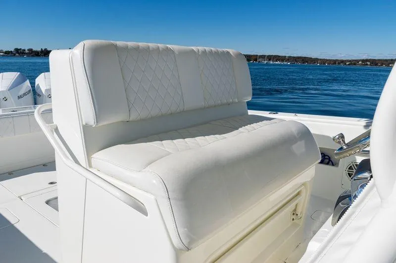 Slide: The Image of Luxurious seating on 2016 SeaVee 390Z boat with ocean backdrop. - 30