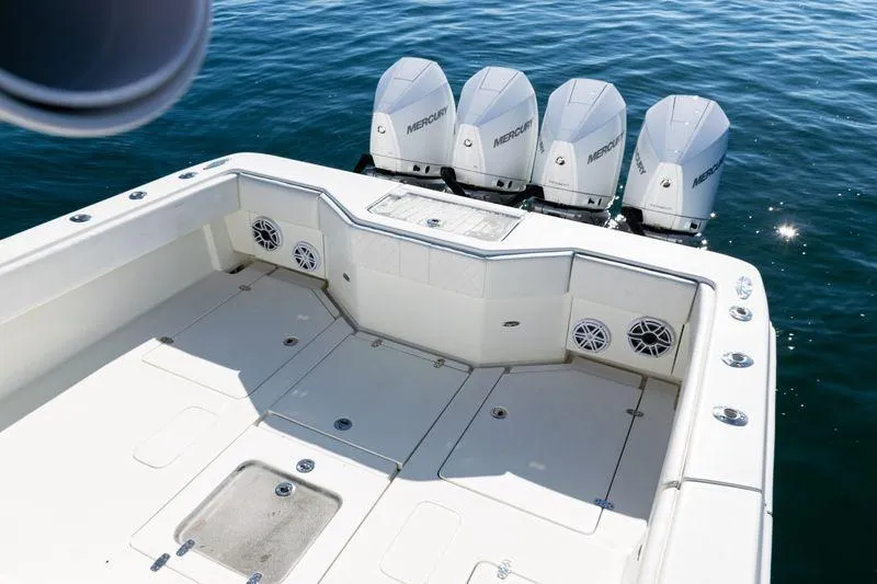 Slide: The Image of 2016 SeaVee 390Z boat with four Mercury outboard engines on calm water. - 41