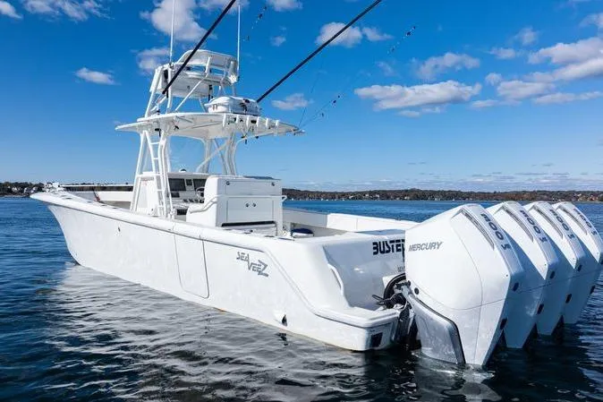Slide: The Image of 2016 SeaVee 390Z boat with four Mercury engines on a sunny day. - 9