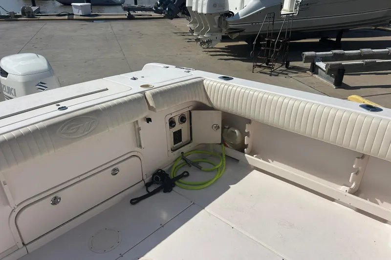 Slide: The Image of 2004 Grady-White Marlin 300 boat interior with storage and utility features. - 10