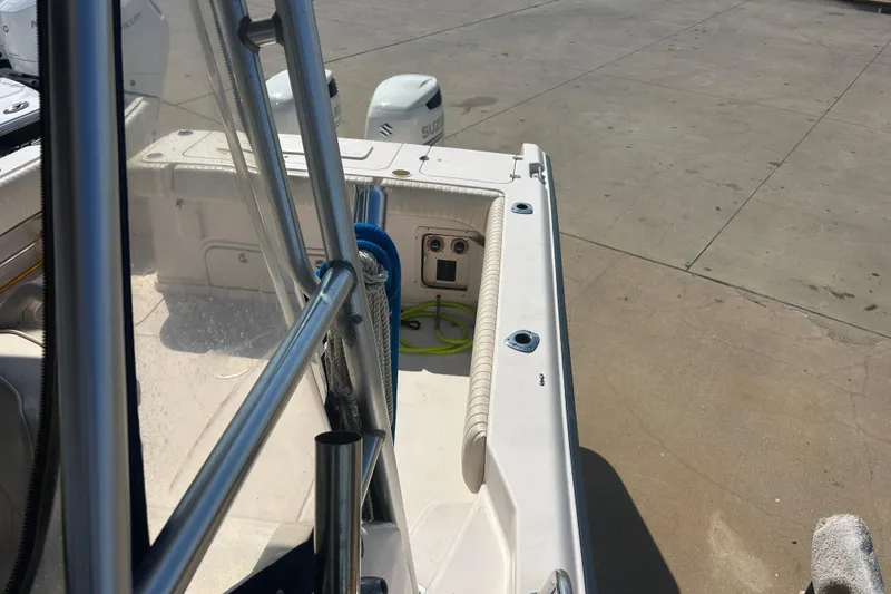 Slide: The Image of 2004 Grady-White Marlin 300 boat interior with visible railing and deck details. - 36