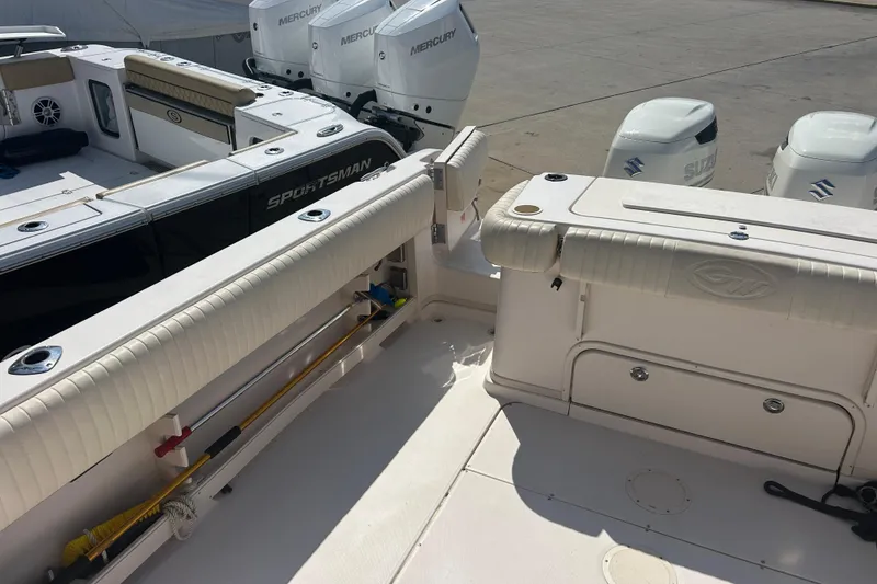 Slide: The Image of 2004 Grady-White Marlin 300 boat interior with Mercury and Suzuki engines. - 8