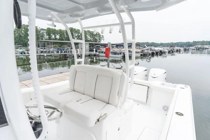 Slide: The Image of Manufacturer Provided Image: 2025 Sea Hunt Gamefish 30 boat with forward seating at a marina. - 10