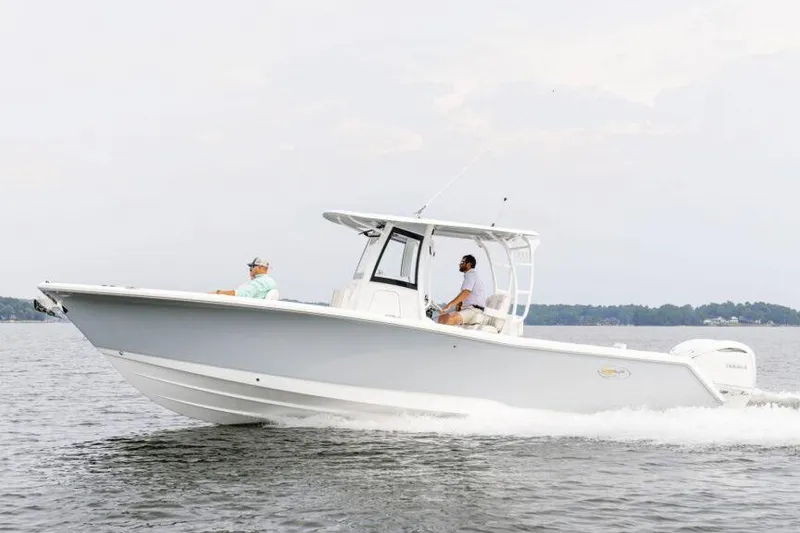 Slide: The Image of Manufacturer Provided Image: 2025 Sea Hunt Gamefish 30 Forward Seating boat cruising on open water. - 4