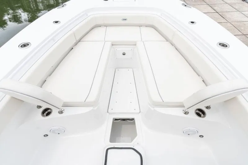Slide: The Image of Manufacturer Provided Image: 2025 Sea Hunt Gamefish 30 Forward Seating, white cushioned bow area, sleek design. - 5
