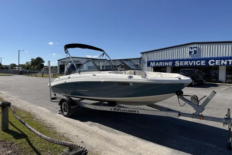 Slide: The Image of 2024 Stingray 191 DC boat on trailer at Marine Service Center. - 4