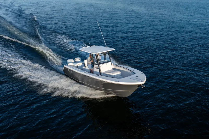 Slide: The Image of 2026 Sea Hunt Gamefish 27 Coffin Box cruising on open water. - 9