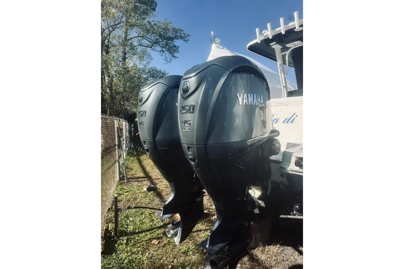 Slide: The Image of 2022 Robalo R272 Center Console with dual Yamaha 250 outboard engines. - 15