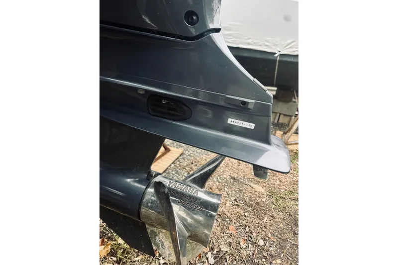 Slide: The Image of 2022 Robalo R272 Center Console boat with Yamaha propeller detail. - 31