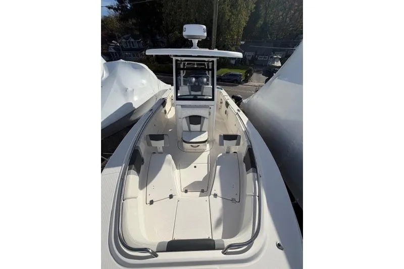 Slide: The Image of 2022 Robalo R272 Center Console boat with spacious seating and modern design. - 43