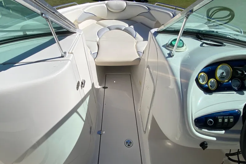 Slide: The Image of 2002 Monterey 268SS Super Sport boat interior with seating and dashboard controls. - 4