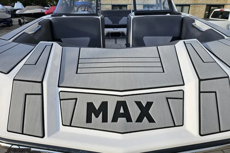 Slide: The Image of 2020 Moomba Max boat interior with sleek gray seating and modern design. - 17