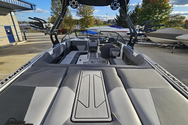 Slide: The Image of 2020 Moomba Max boat interior with sleek seating and modern dashboard. - 42