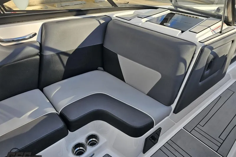 Slide: The Image of 2020 Moomba Max boat interior with sleek gray seating and modern design elements. - 53