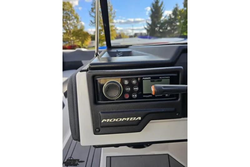 Slide: The Image of 2020 Moomba Max boat dashboard with Fusion stereo system. - 63