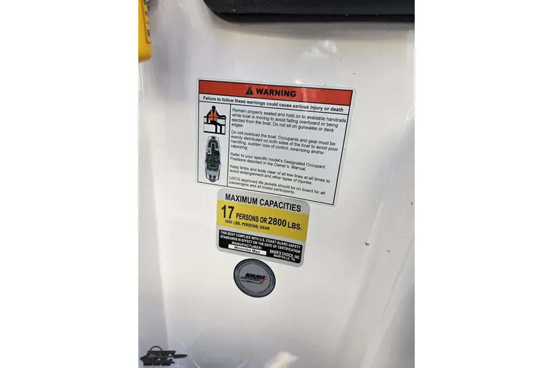 Slide: The Image of Warning label on 2020 Moomba Max boat, indicating maximum capacity of 17 persons or 2800 lbs. - 66