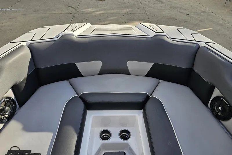 Slide: The Image of Interior seating of a 2020 Moomba Max boat, featuring gray and white upholstery. - 73