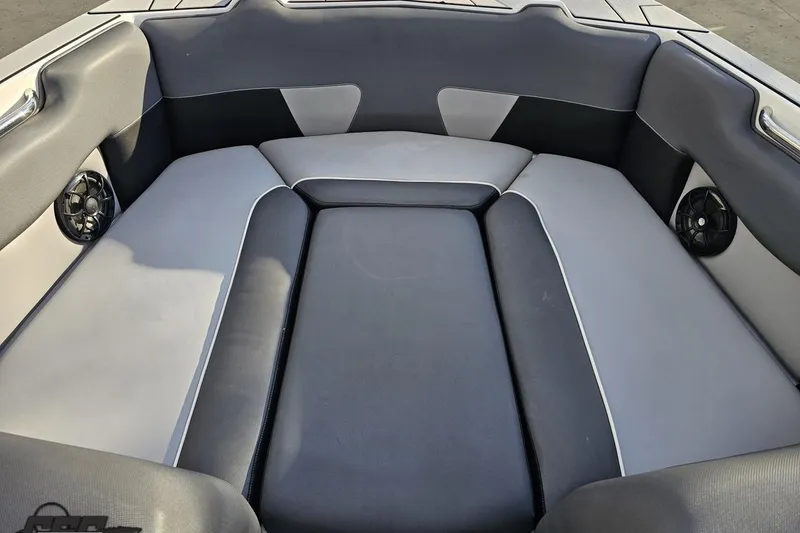 Slide: The Image of Interior seating of 2020 Moomba Max boat with gray and black upholstery. - 82