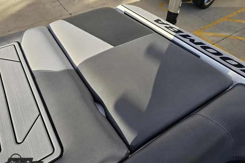Slide: The Image of 2020 Moomba Max boat interior with gray and white upholstery. - 94