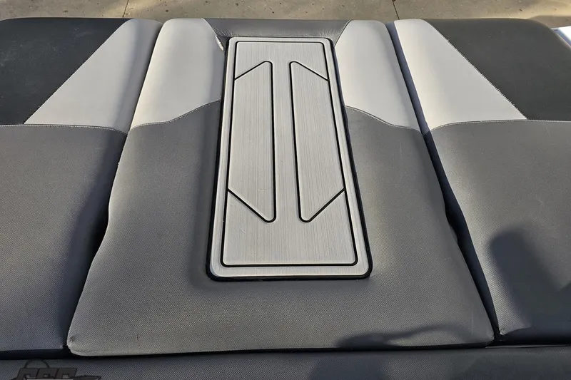 Slide: The Image of 2020 Moomba Max boat seat with sleek gray and white upholstery design. - 96
