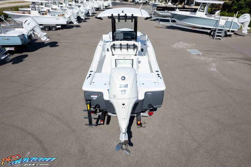 Slide: The Image of 2026 Sea Hunt BX 25 FS boat with Yamaha 350 V6 engine in a marina. - 14