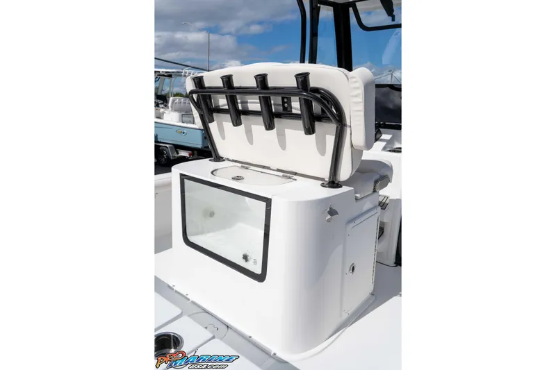 Slide: The Image of 2026 Sea Hunt BX 25 FS boat interior with cushioned seating and storage compartment. - 39