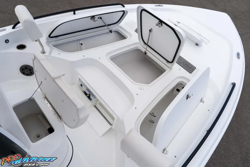 Slide: The Image of 2026 Sea Hunt BX 25 FS boat deck with open storage compartments and seating. - 48