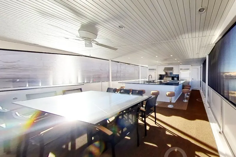 Slide: The Image of Luxurious 2022 Adonia Splendor yacht interior with dining area and modern kitchen. - 23