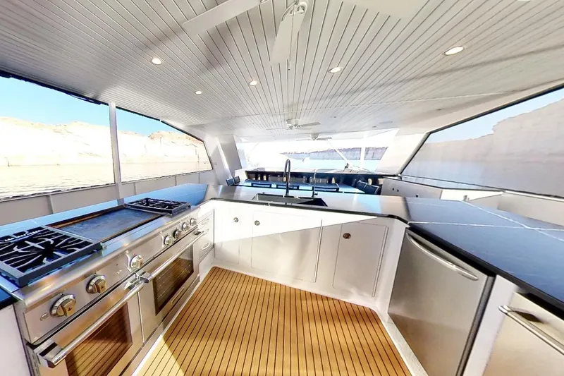 Slide: The Image of Luxurious 2022 Adonia Splendor yacht kitchen with modern appliances and sleek design. - 27
