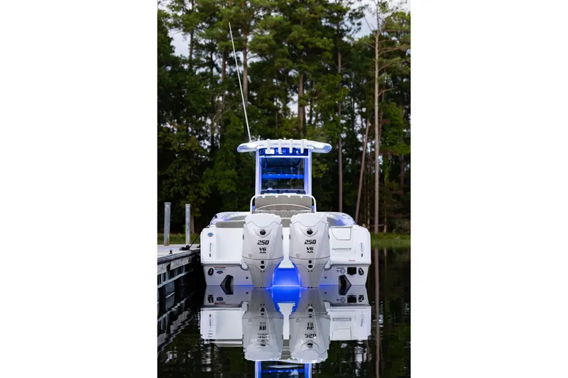 Slide: The Image of 2026 Sea Hunt Ultra 275 Coffin Box boat docked, featuring dual 250 V6 engines. - 41