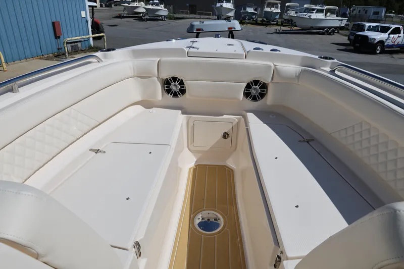 Slide: The Image of 2025 Grady-White Freedom 275 boat interior with spacious seating and modern design. - 5