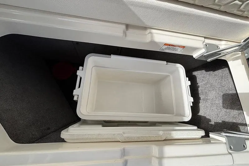 Slide: The Image of Storage compartment with cooler on 2018 Sea Ray SDX 270 Outboard boat. - 14