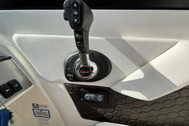 Slide: The Image of Throttle control panel of 2018 Sea Ray SDX 270 Outboard boat. - 17