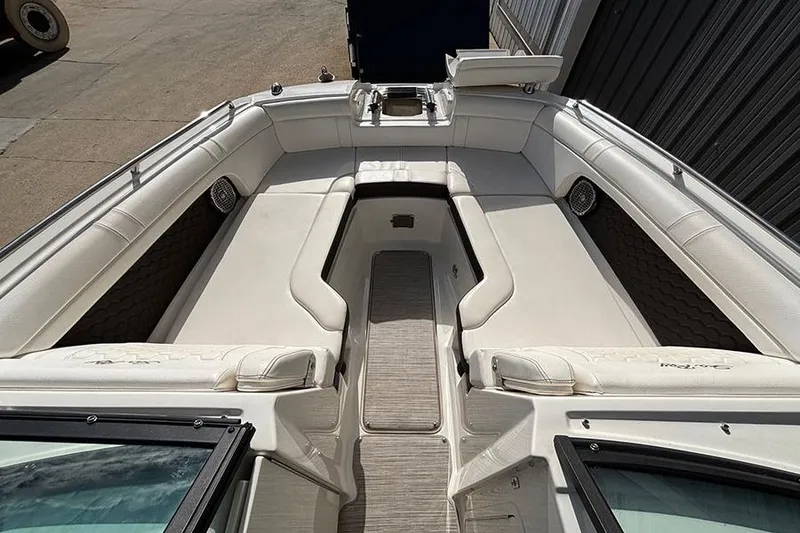 Slide: The Image of 2018 Sea Ray SDX 270 Outboard boat interior with spacious seating and sleek design. - 20