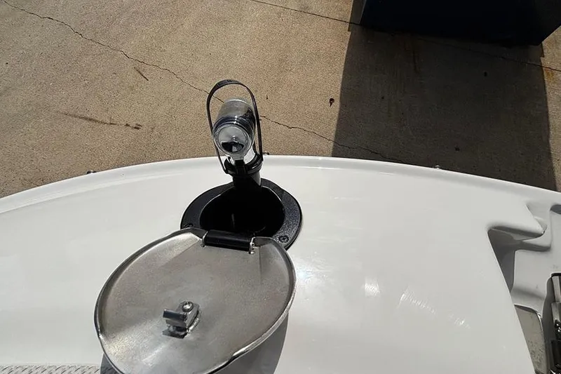 Slide: The Image of 2018 Sea Ray SDX 270 Outboard boat deck with navigation light and open hatch. - 22