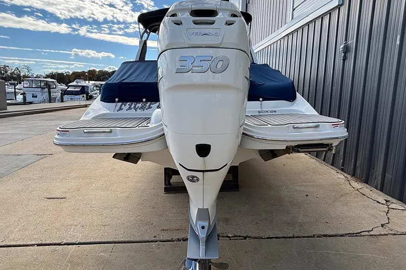 Slide: The Image of 2018 Sea Ray SDX 270 Outboard with 350 Verado engine, docked outdoors. - 3