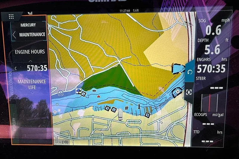 Slide: The Image of Navigation display of a 2018 Sea Ray SDX 270 Outboard showing map, speed, and engine hours. - 7