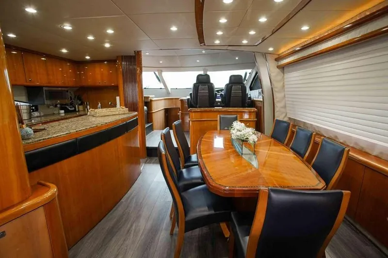 Slide: The Image of Luxurious interior of 2006 Sunseeker Manhattan Motor 82 yacht with elegant dining area. - 15