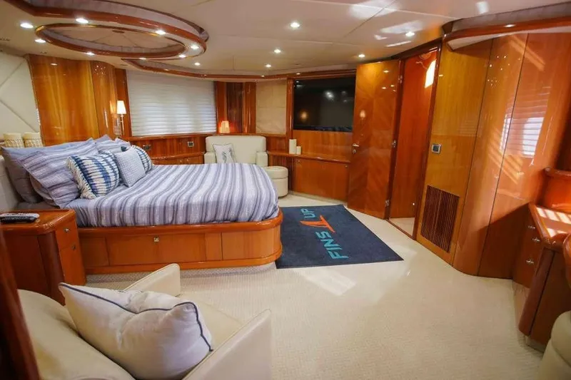Slide: The Image of Luxurious bedroom interior of 2006 Sunseeker Manhattan Motor 82 yacht with elegant wood finishes. - 22