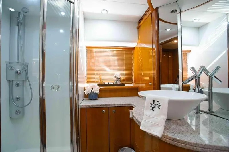 Slide: The Image of Luxurious bathroom in 2006 Sunseeker Manhattan Motor 82 yacht with modern fixtures. - 27