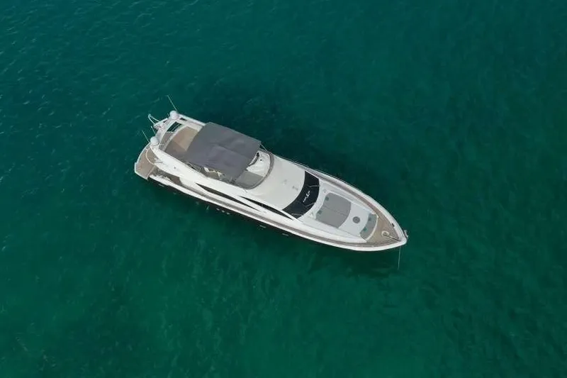 Slide: The Image of Aerial view of 2006 Sunseeker Manhattan Motor 82 yacht on clear blue water. - 5