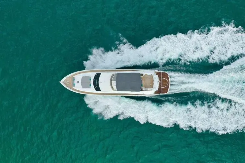 Slide: The Image of Aerial view of 2006 Sunseeker Manhattan Motor 82 yacht cruising in turquoise waters. - 9
