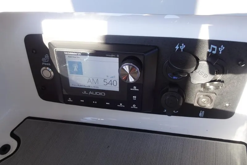 Slide: The Image of 2024 Nautique Super Air Nautique G23 audio control panel with JL Audio system. - 29